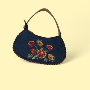 Raw denim and leather floral purse